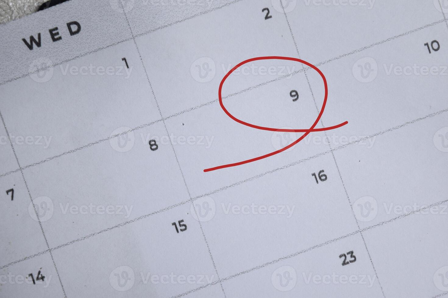 Focus on number 9 in calendar and emptyred ellipse. Save the date. Day of the year concept. photo