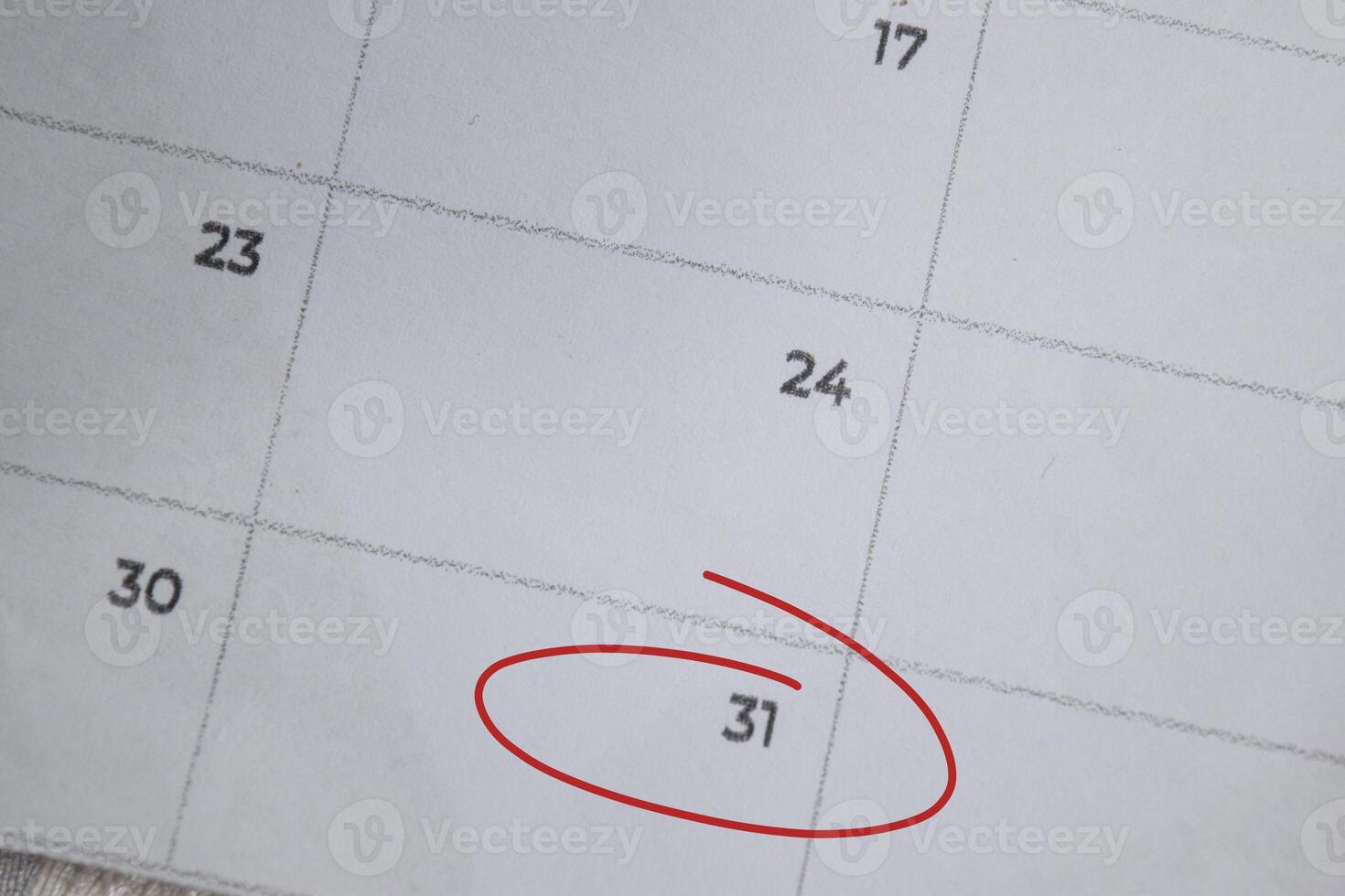 Focus on number 31 in calendar and emptyred ellipse. Save the date. Day of the year concept. photo