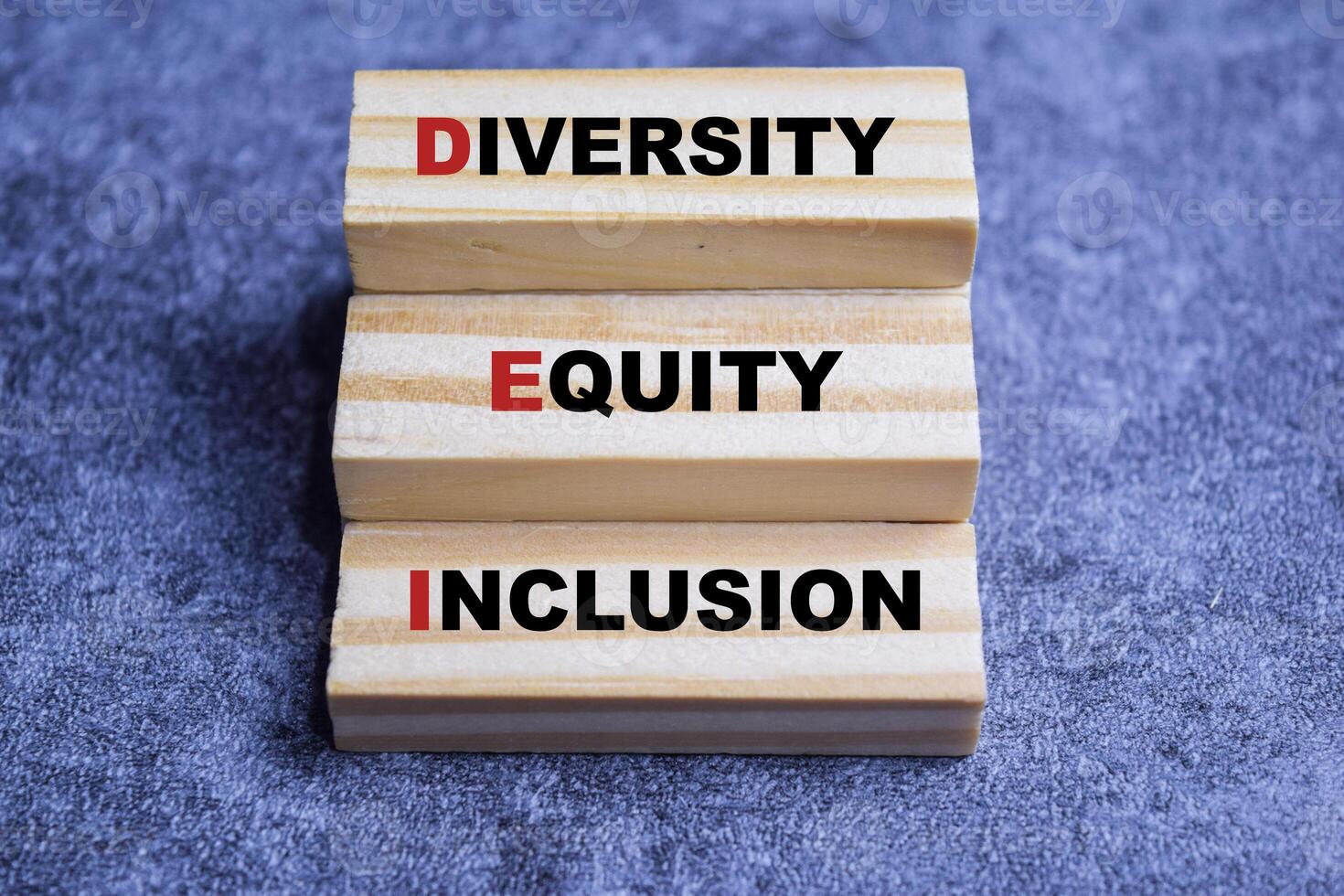 Concept of DEI - Diversity, Equity, Inclusion Symbol. Wooden block with words DEI photo