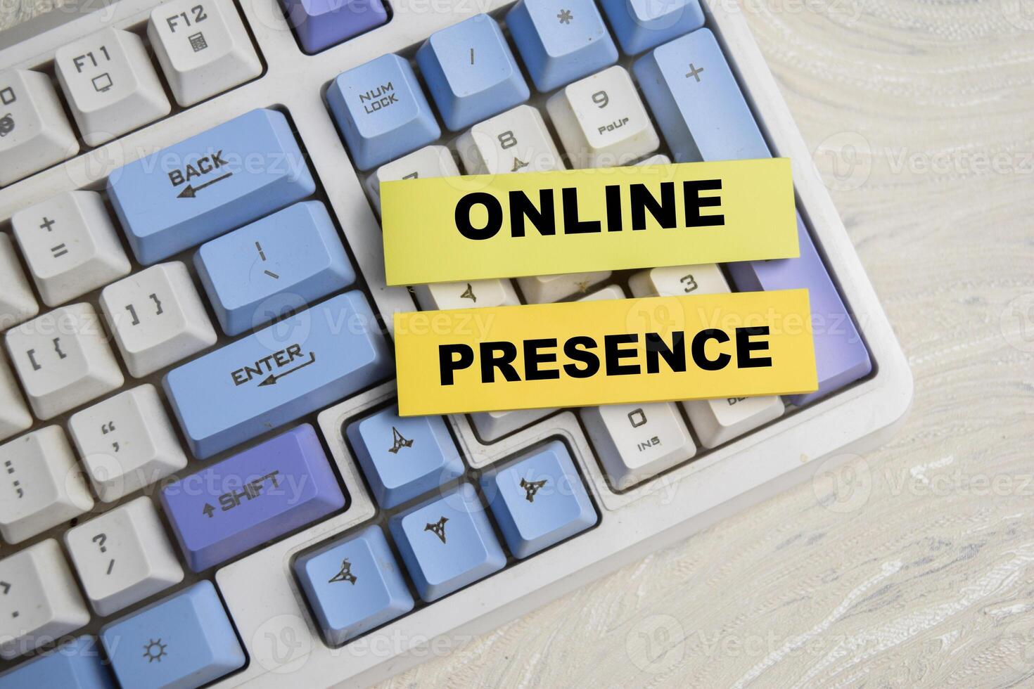 Concept of Online Presence write on sticky notes isolated on Wooden Table. photo
