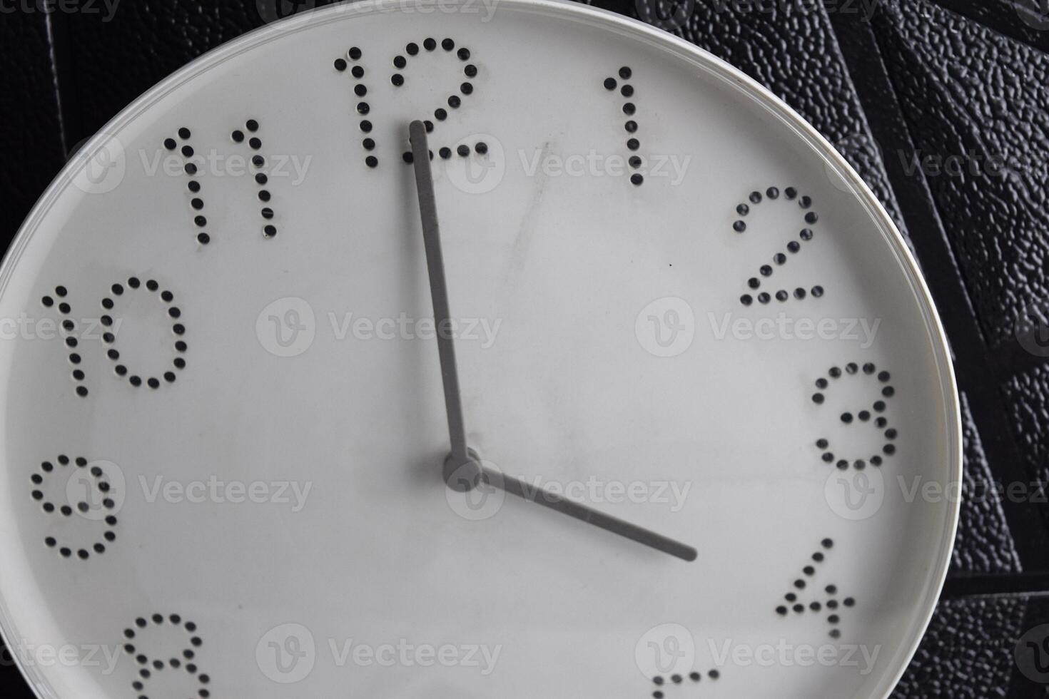 Focus time in clock of four o'clock for design in your business concept isolated on black background. photo