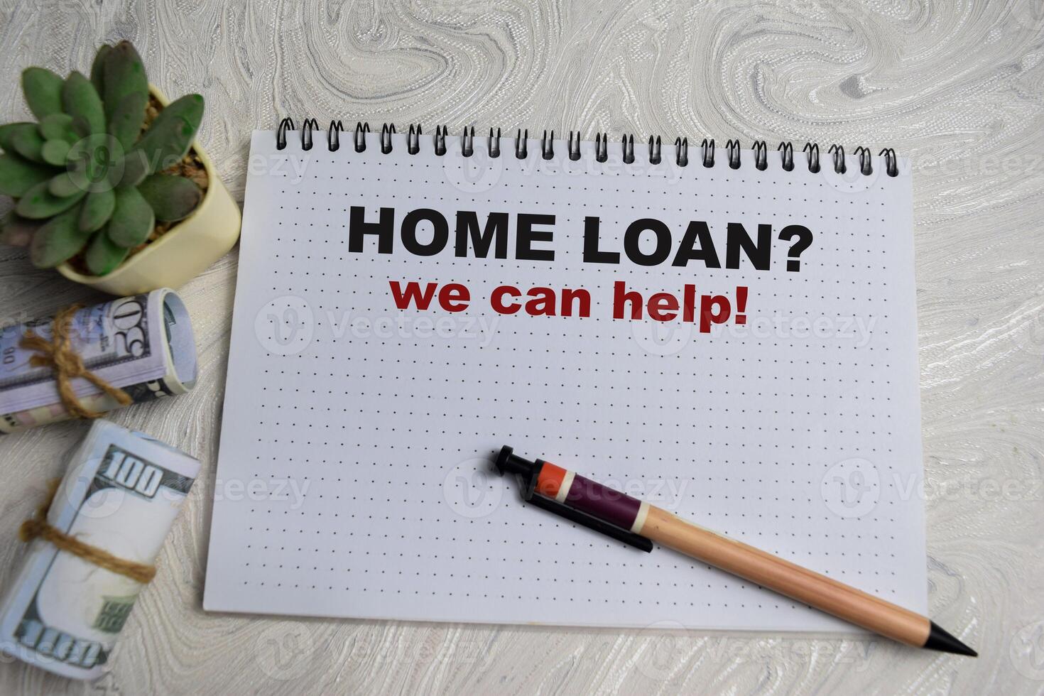 Concept of Home Loan. We can help write on book isolated on Wooden Table. photo