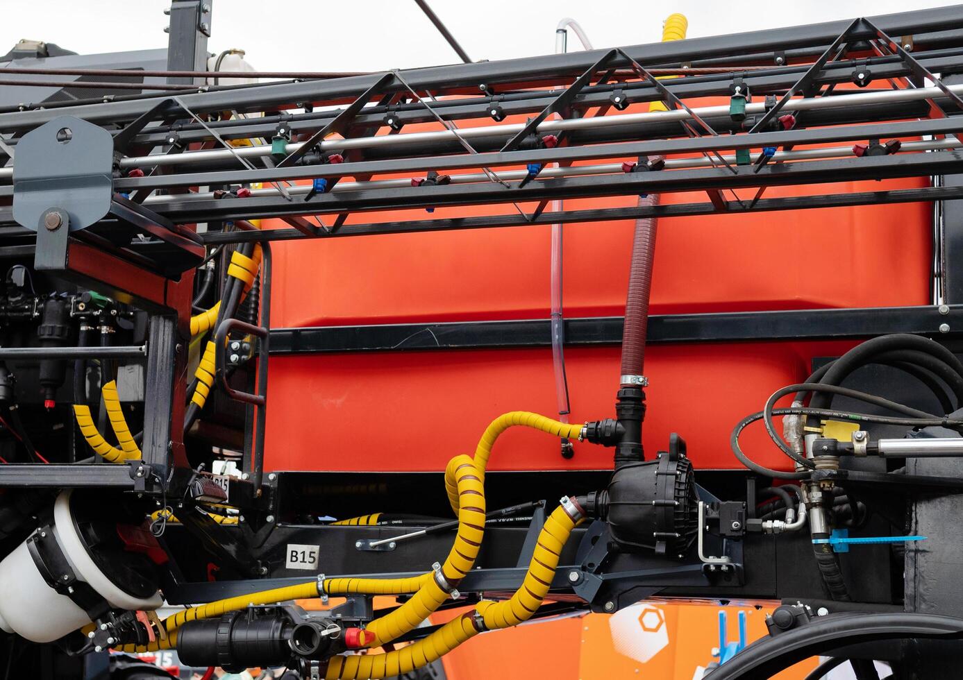 Fragment of yellow diesel engine for electrical generator in power station photo