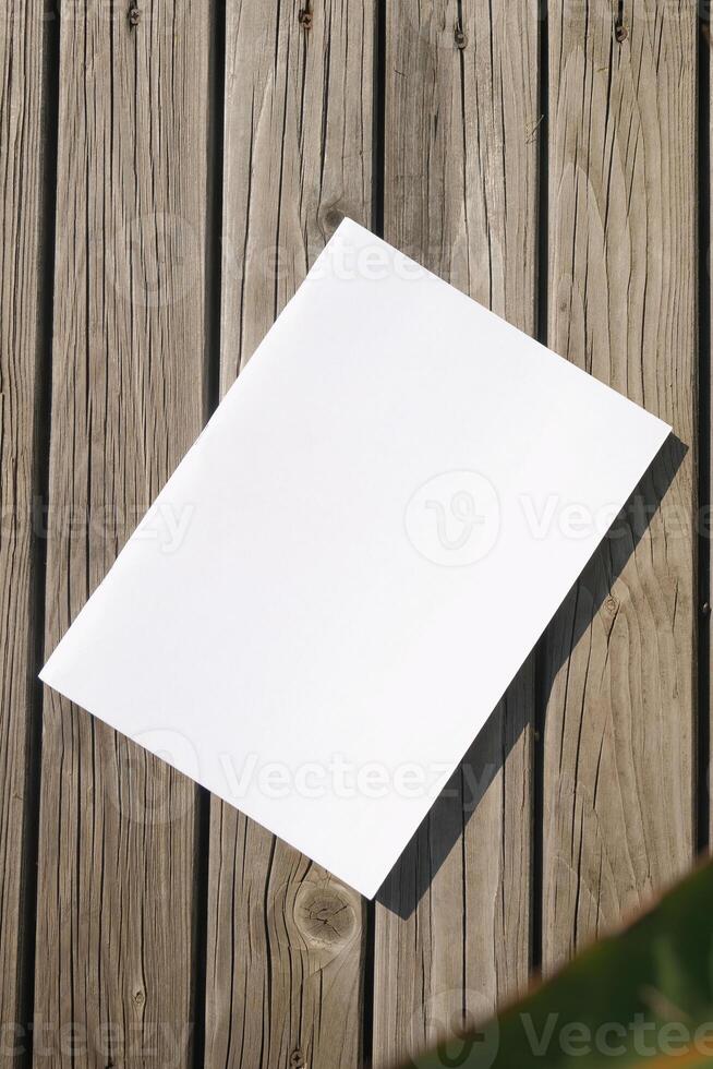 blank magazine mockup on rustic wooden background photo