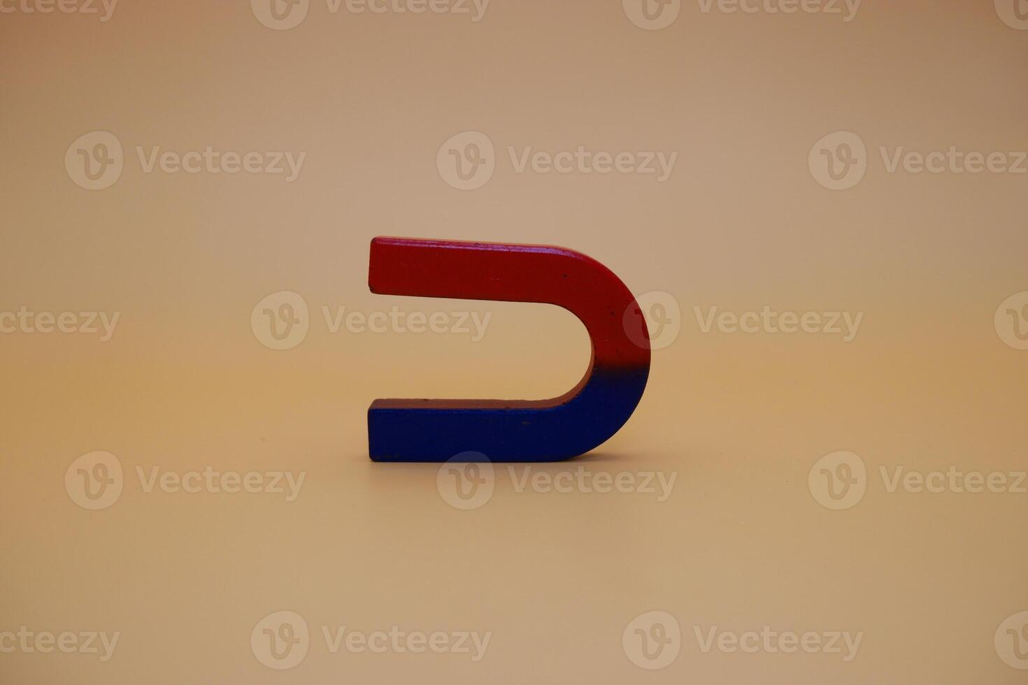 Bicolor Horseshoe Magnet on Studio Backdrop photo