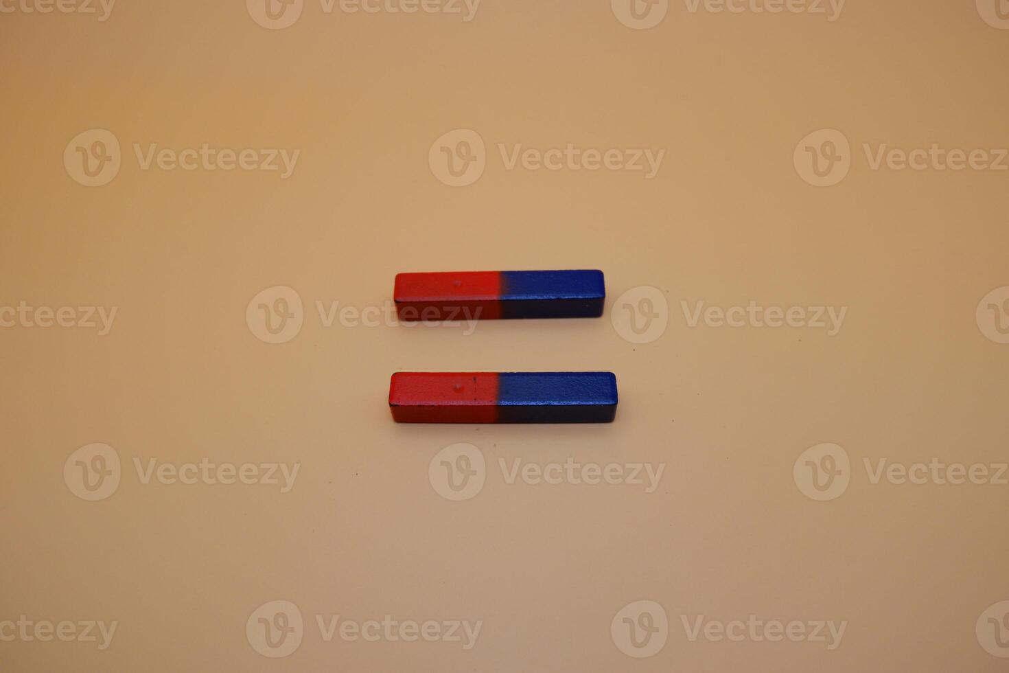 Red and Blue Magnetic Bars Lying Side by Side photo
