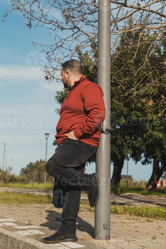 Worker Waiting In The Park During Work Pause photo