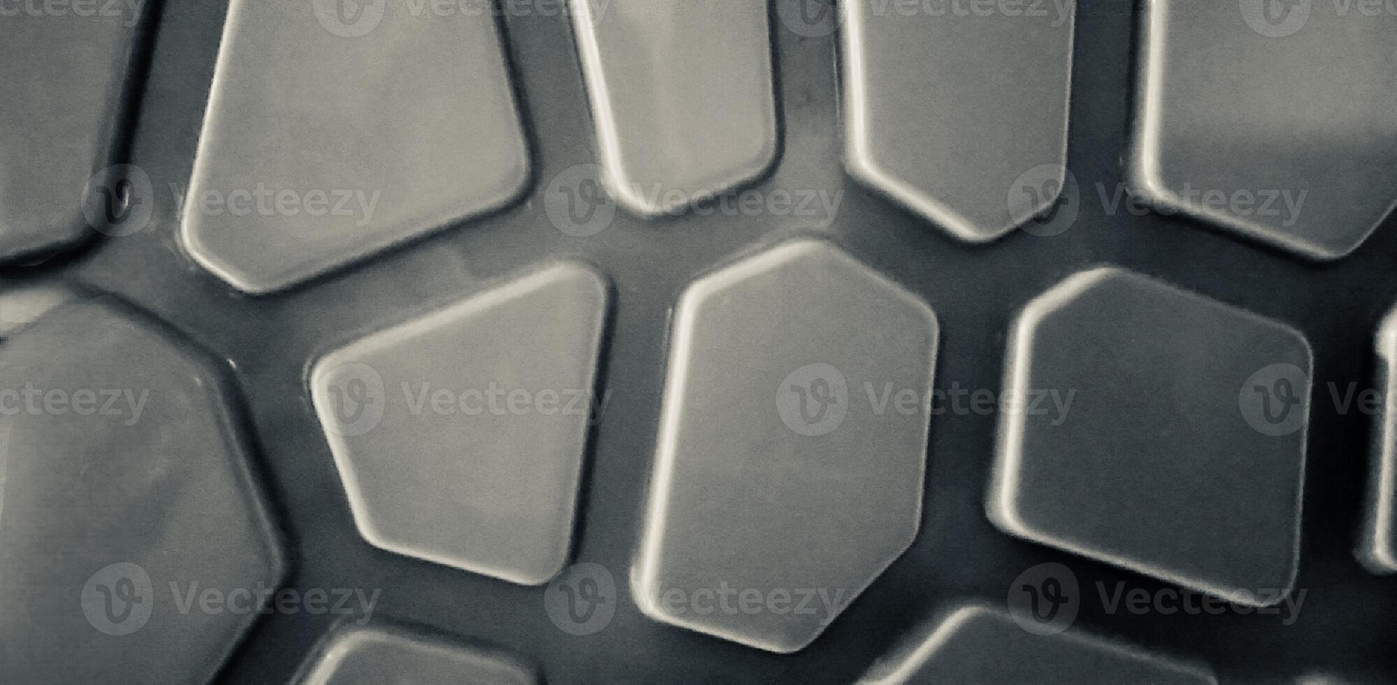 Abstract background geometric pattern in black and white .Closeup of a textured geometric pattern with hexagonal and polygonal shapes, creating a futuristic and modern black-and-white photo