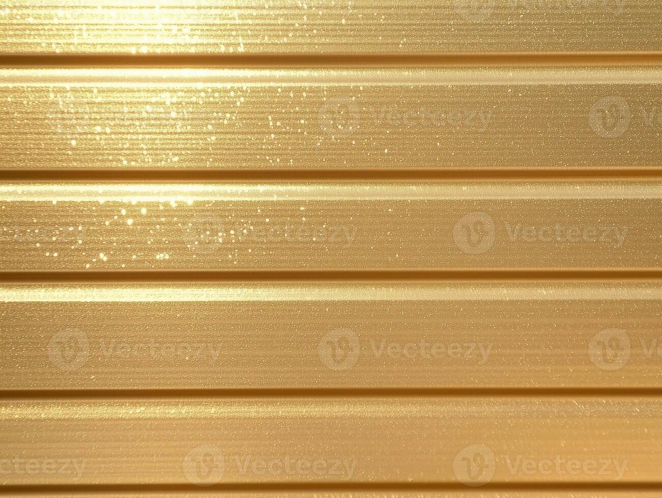 Shiny gold corrugated metal panels texture background with bright reflections and horizontal lines. Metallic siding surface backdrop design. photo