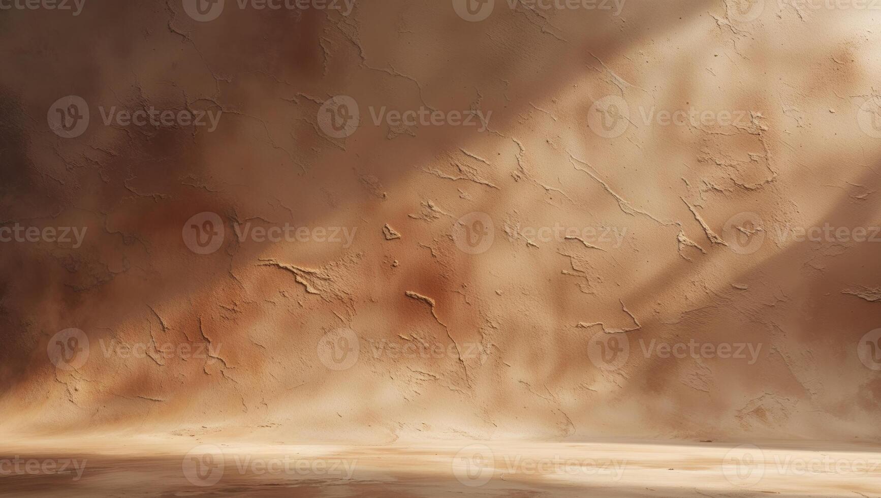 An empty room with a wall and a light coming from the ceiling photo