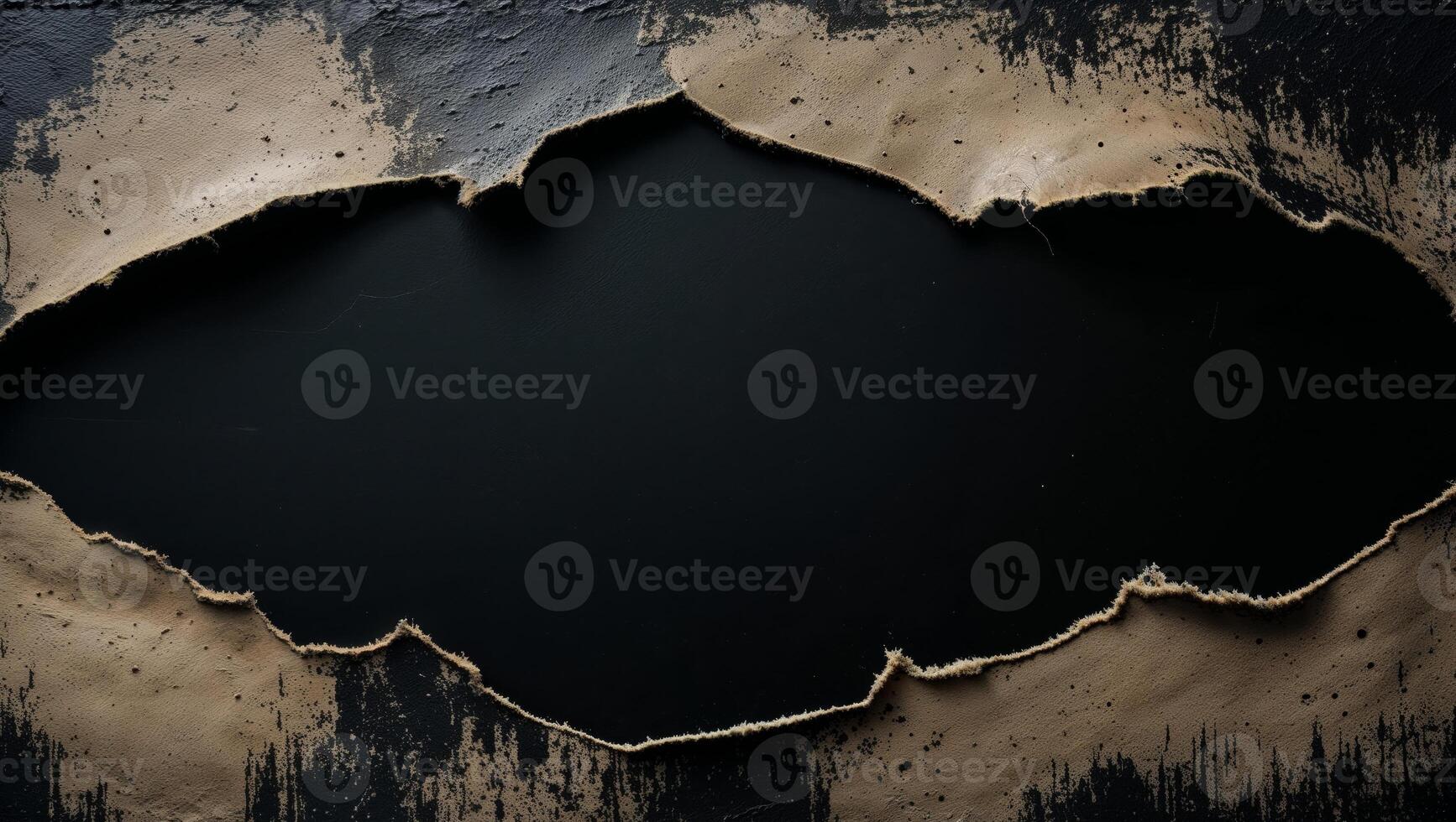 A hole in the wall with a black background photo