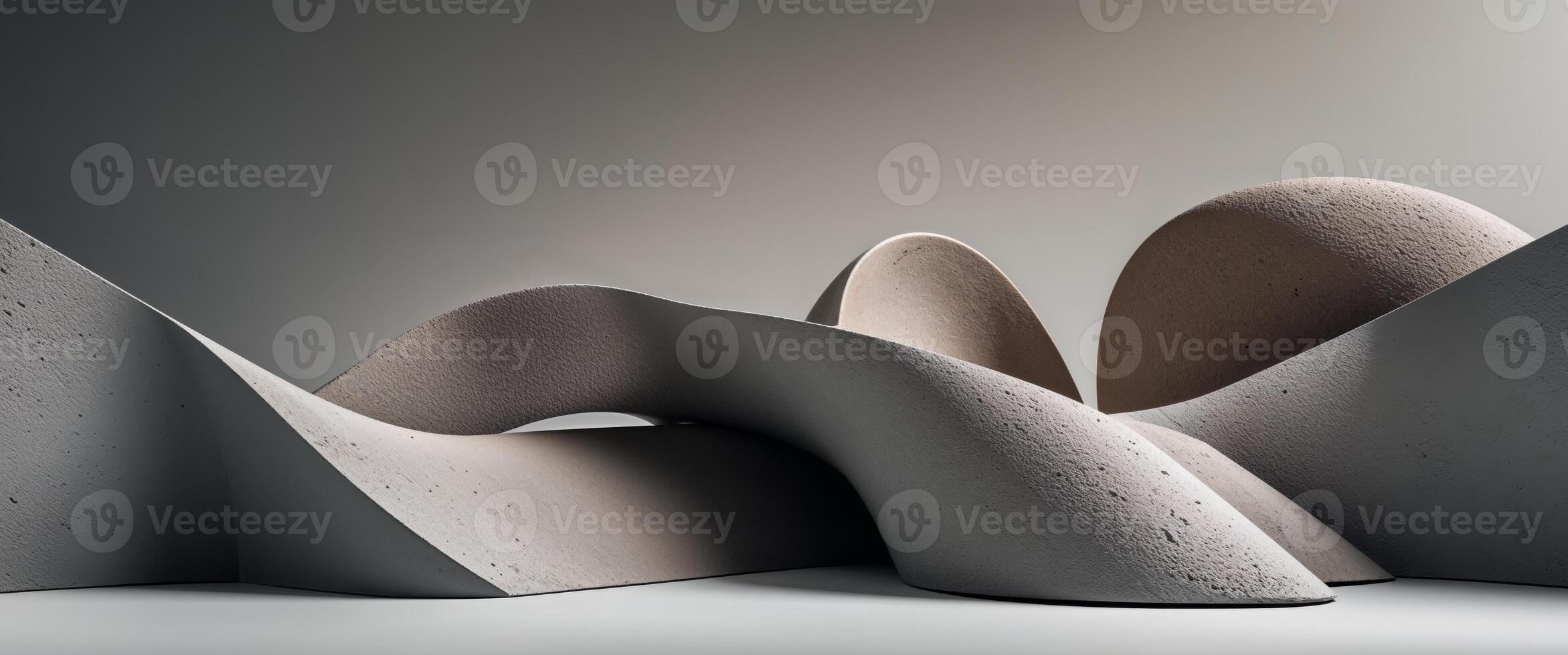 A sculpture made of concrete that looks like a wave photo