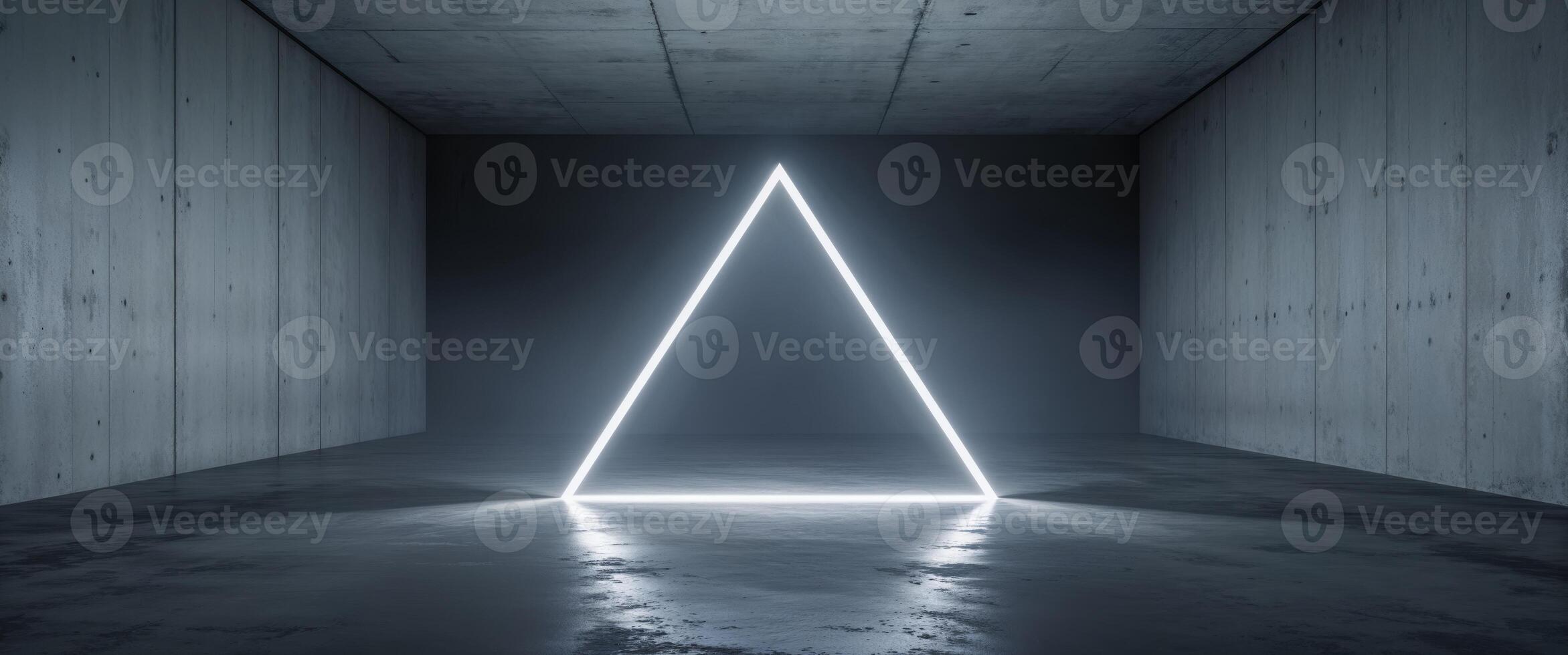A brightly illuminated triangle glows inside a concrete room setting photo