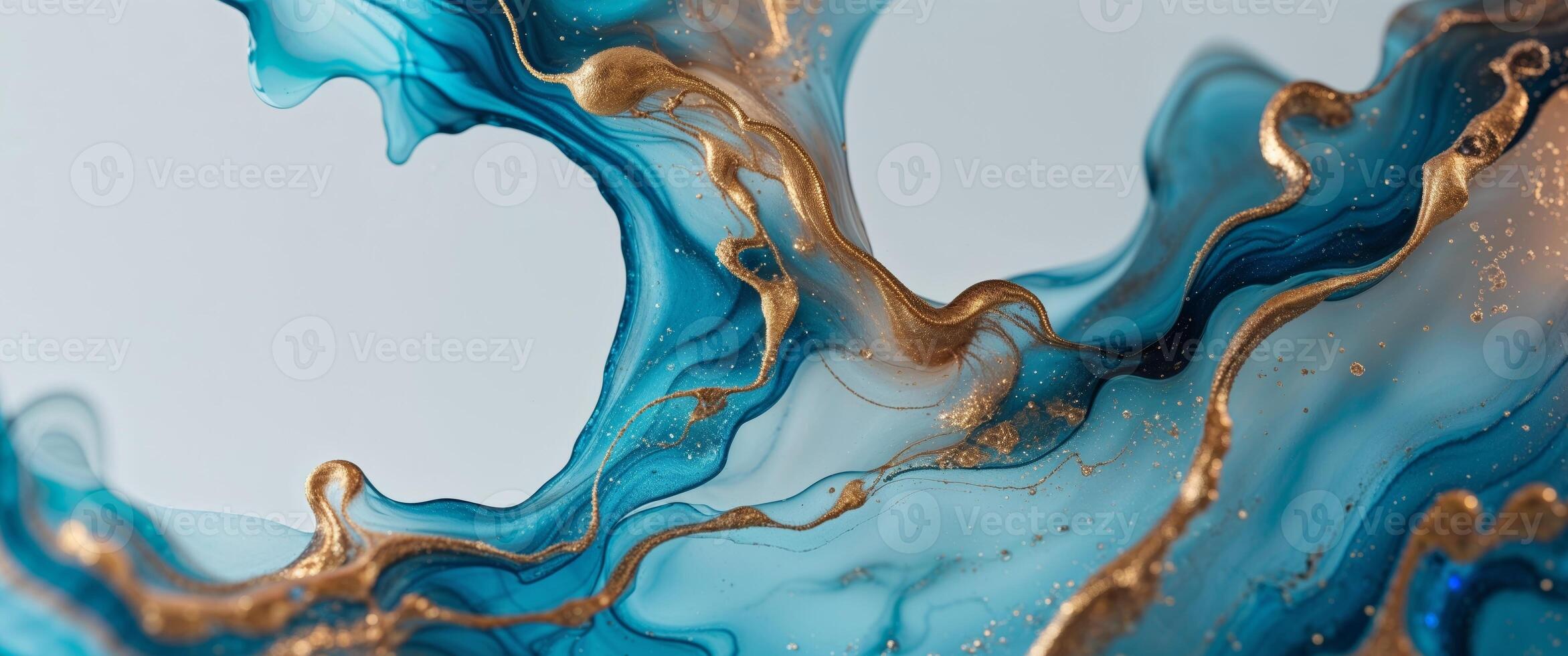Abstract blue and gold liquid flowing over a surface photo