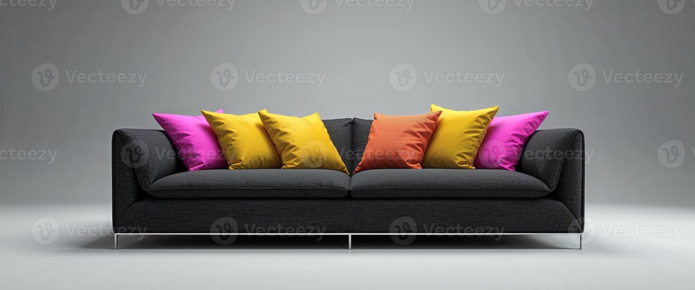 A black couch with colorful pillows on it photo