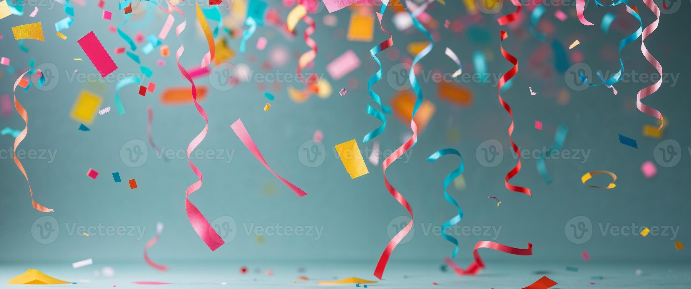 Colorful confetti streamers on a table photo