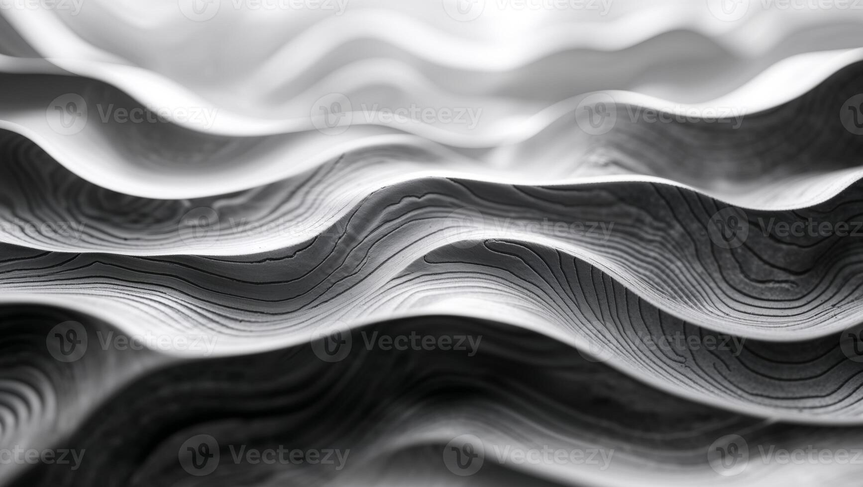 A black and white photo of a wave pattern