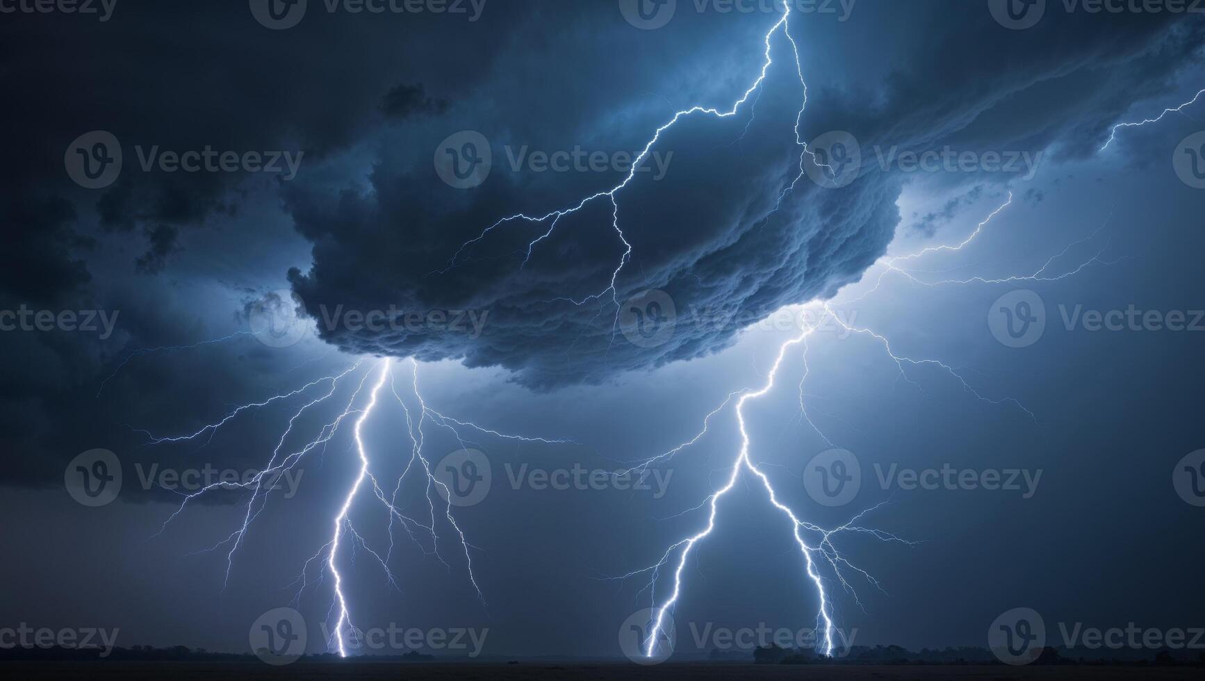Two lightning bolts strike the sky in a dark sky photo