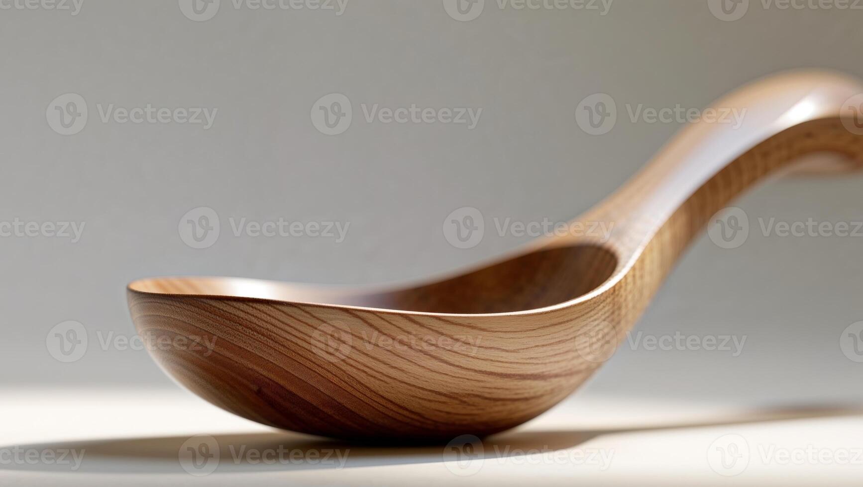 Large Wooden Spoon with Smooth Finish and Ergonomic Design photo