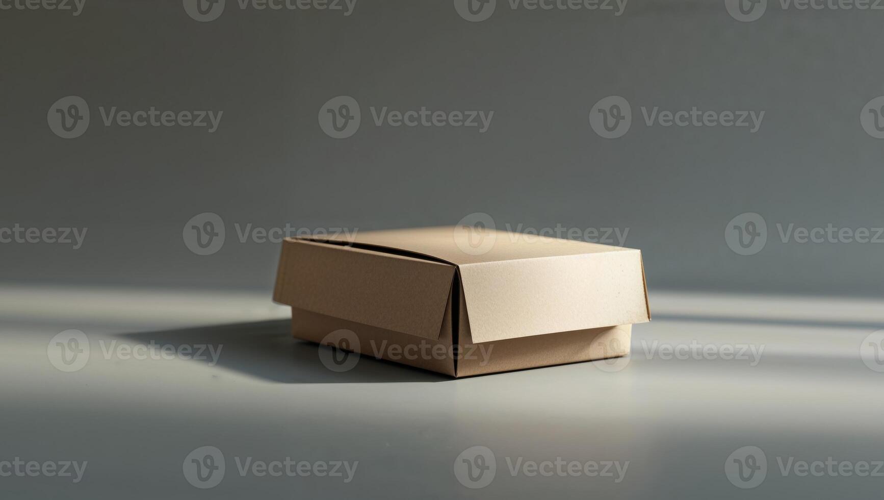 A small cardboard box sitting on a table photo