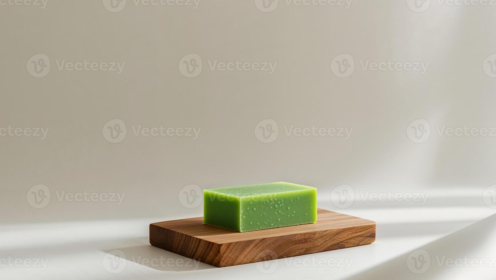 A soap bar on a wooden stand with a green background photo