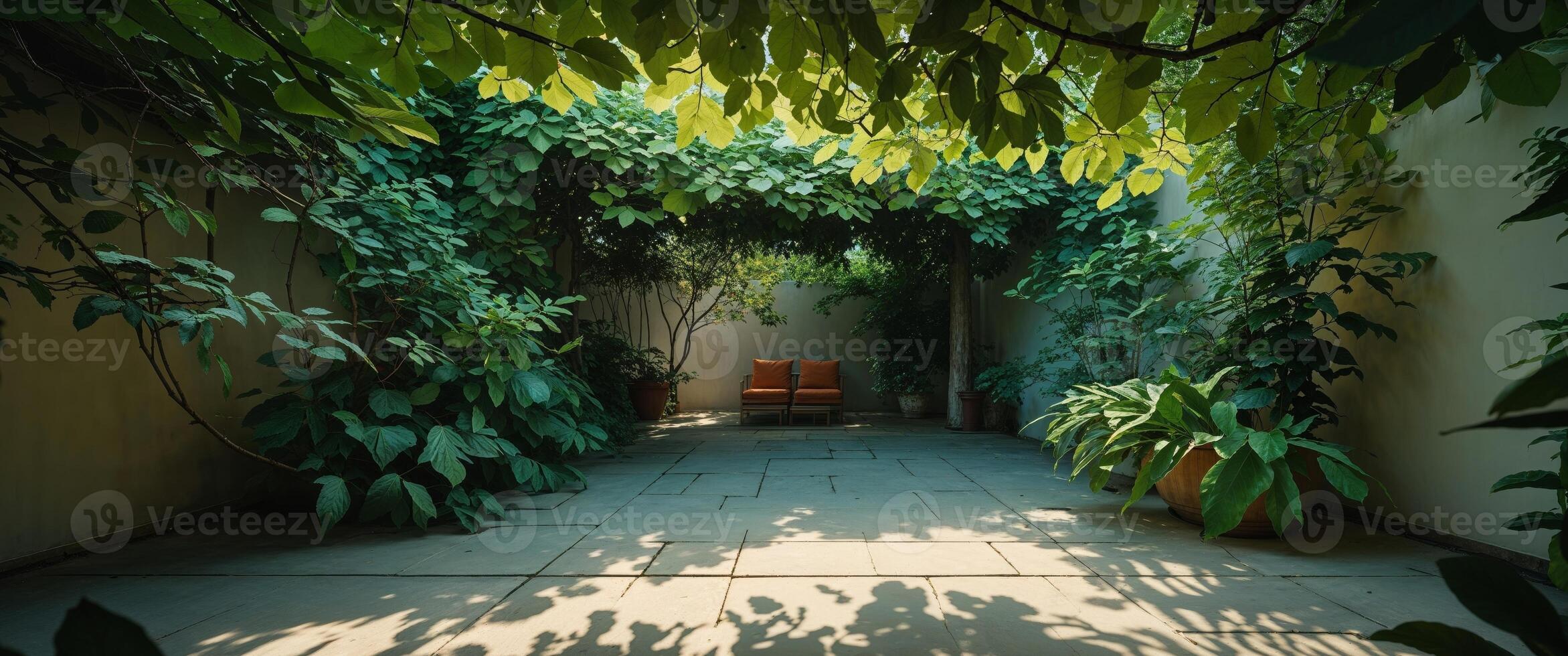 Tranquil outdoor patio setting with lush greenery. photo