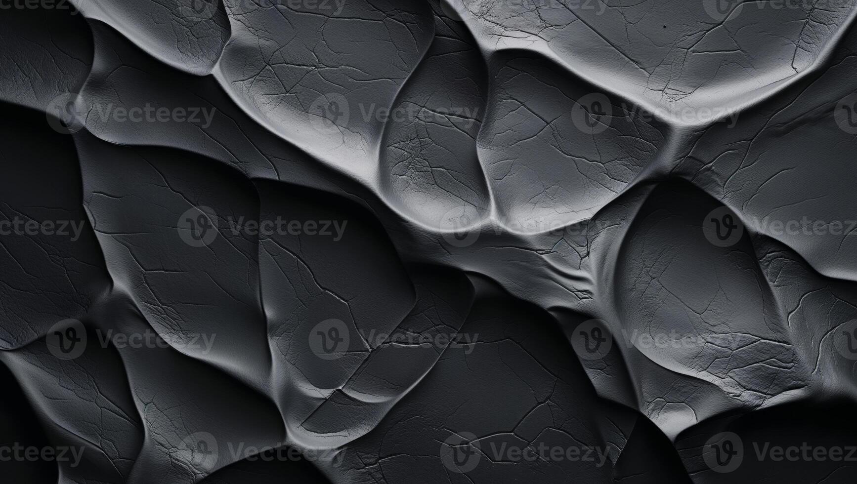 Abstract textured background featuring dark wrinkled surface depth and visual interest with shadows photo