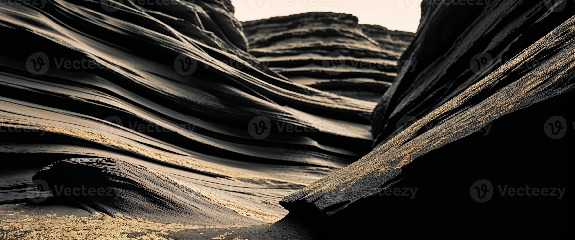 Abstract black and gold rock layers background for design projects photo