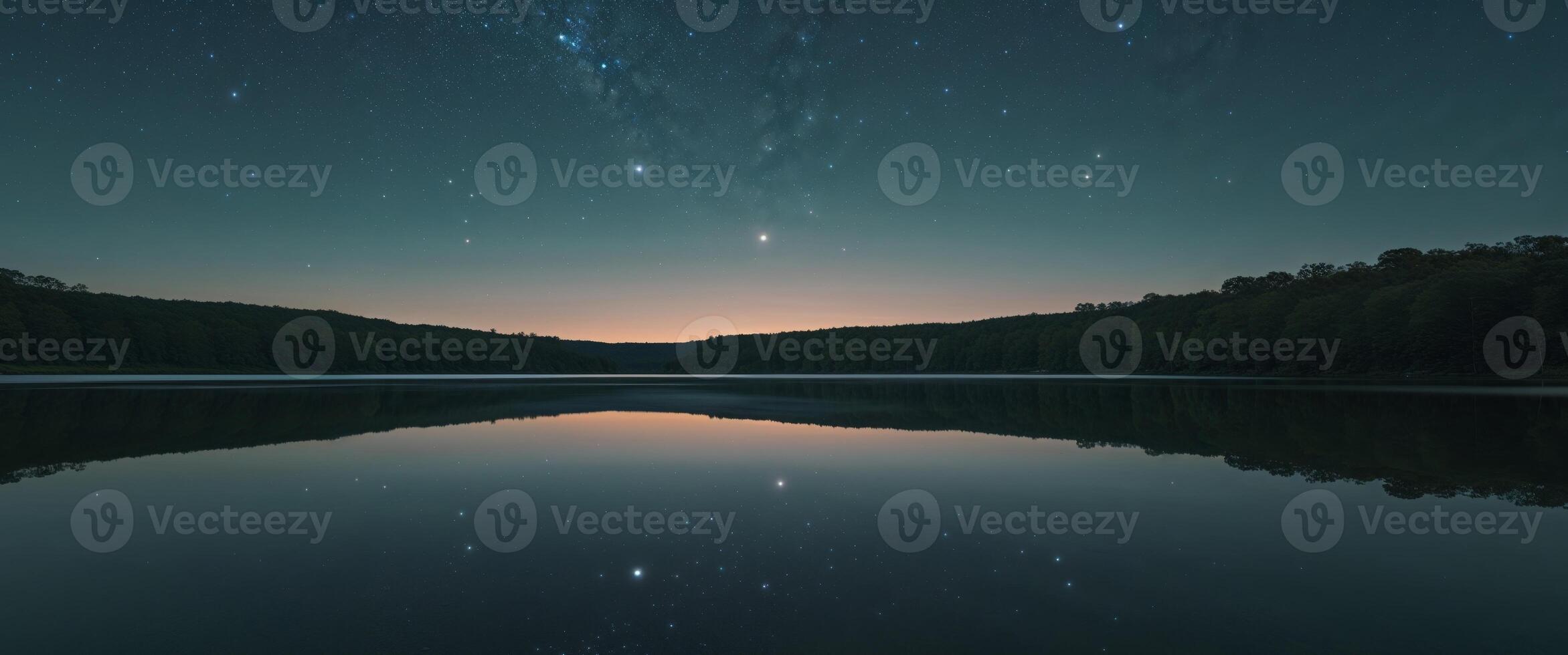 A lake with stars and water reflecting in it photo