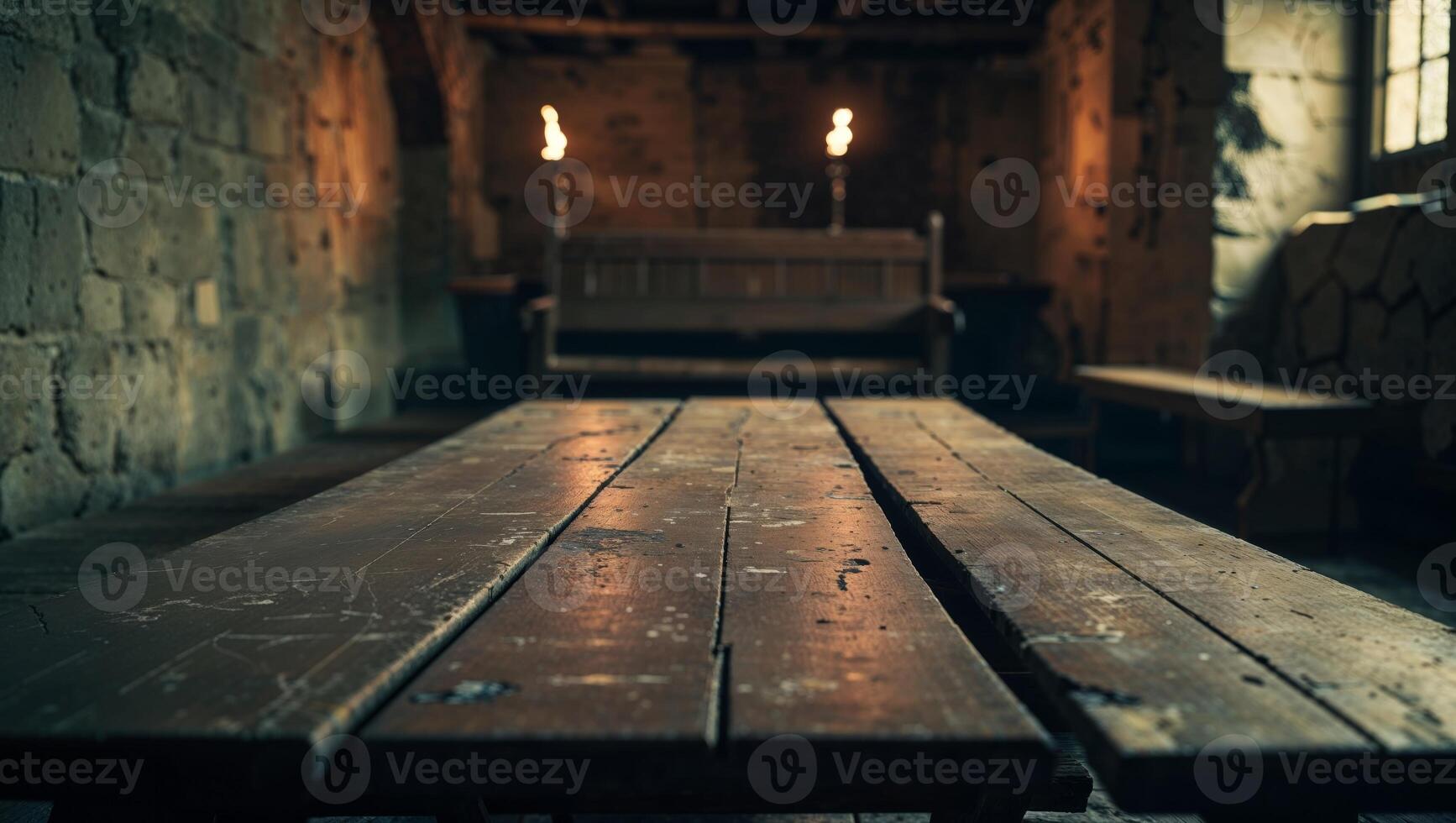 An empty wooden table in a stone room photo