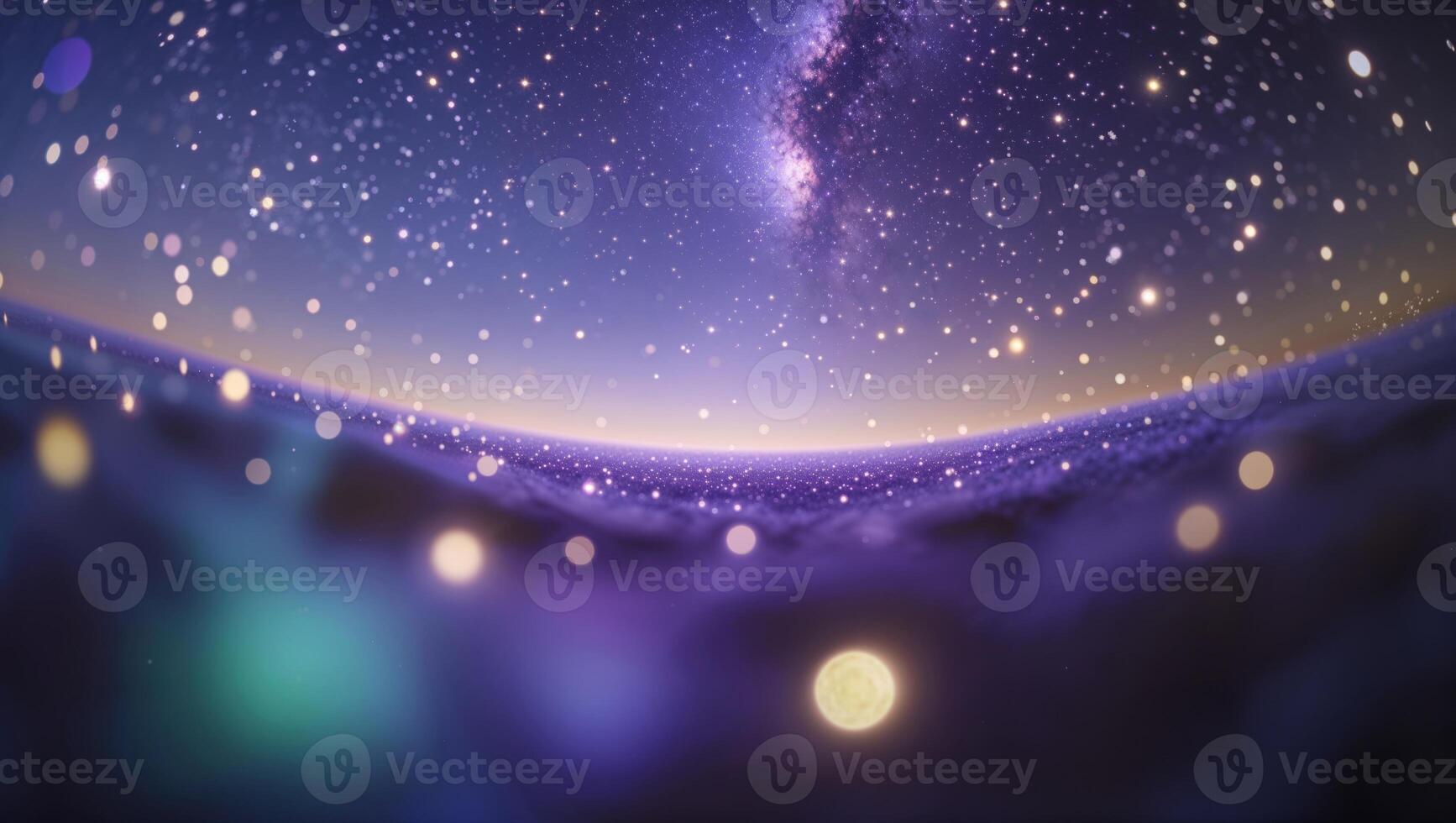 A galaxy and stars are seen in the night sky photo