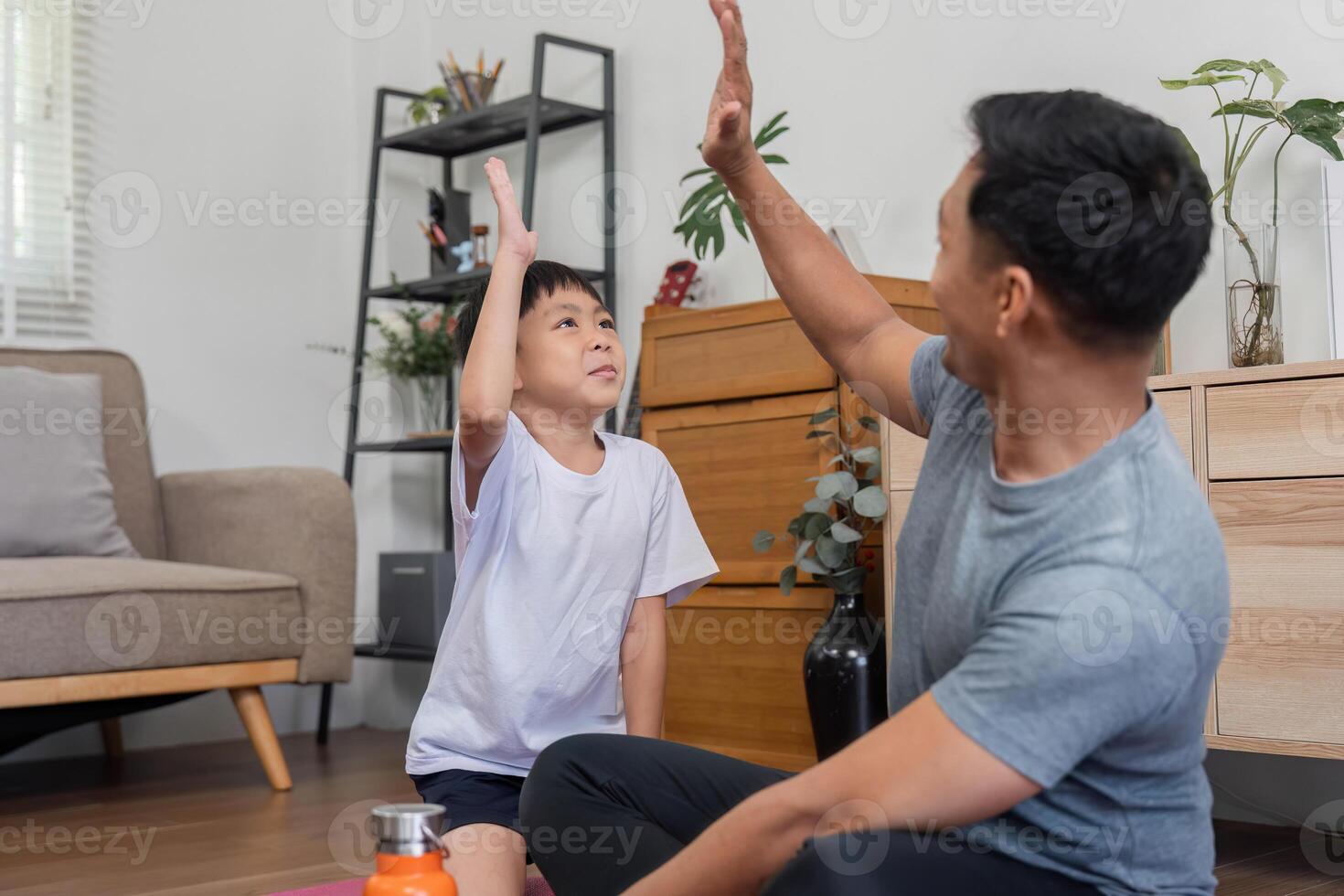 Family bonding through playful fitness activities at home photo