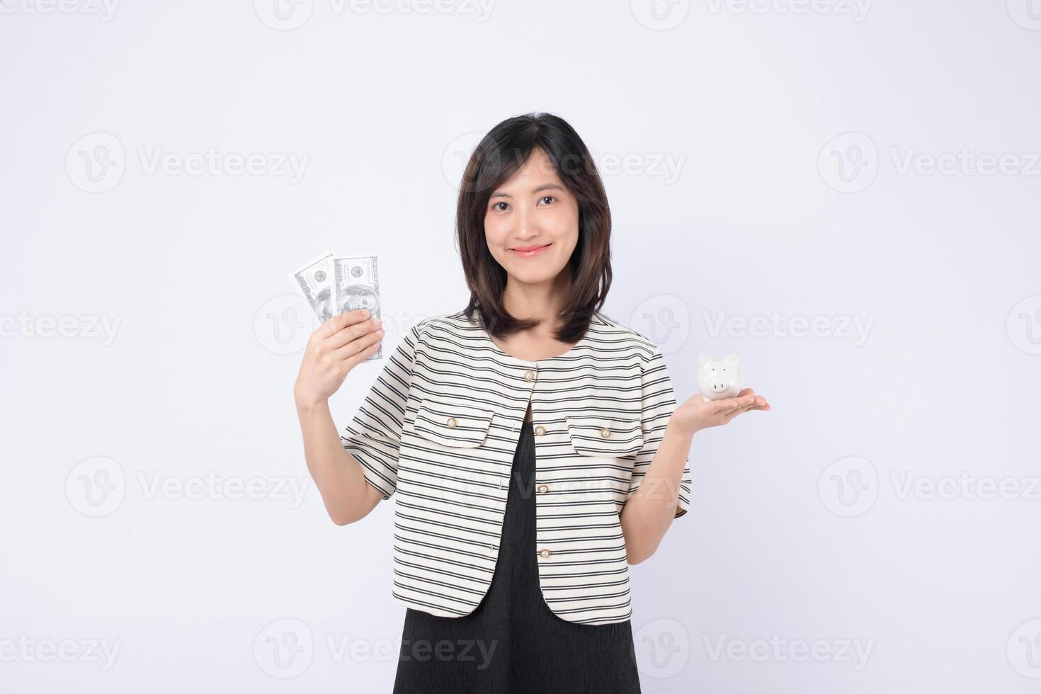 Southeast asian woman shopping online with money and piggy bank smiling happily for saving and financial planning concept photo
