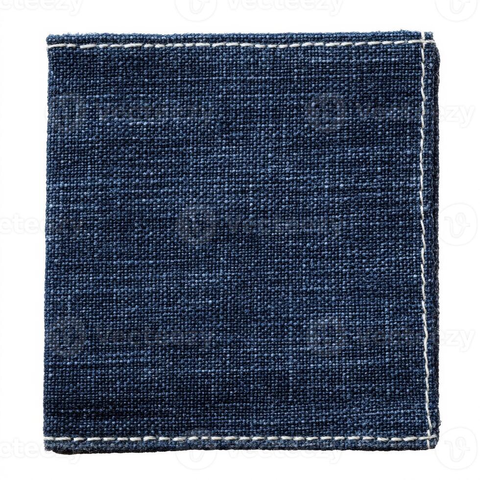 Detailed texture of indigo fabric piece with stitched border creating a square shape photo