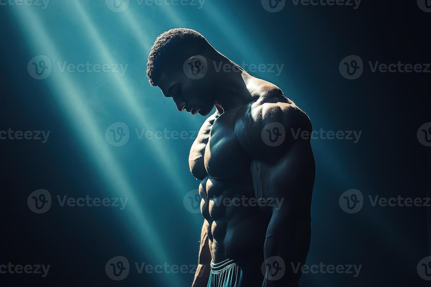 Dynamic Silhouette of a Muscular Athlete Under Dramatic Light Rays Showcasing Strength and Determination in a Focused Pose photo