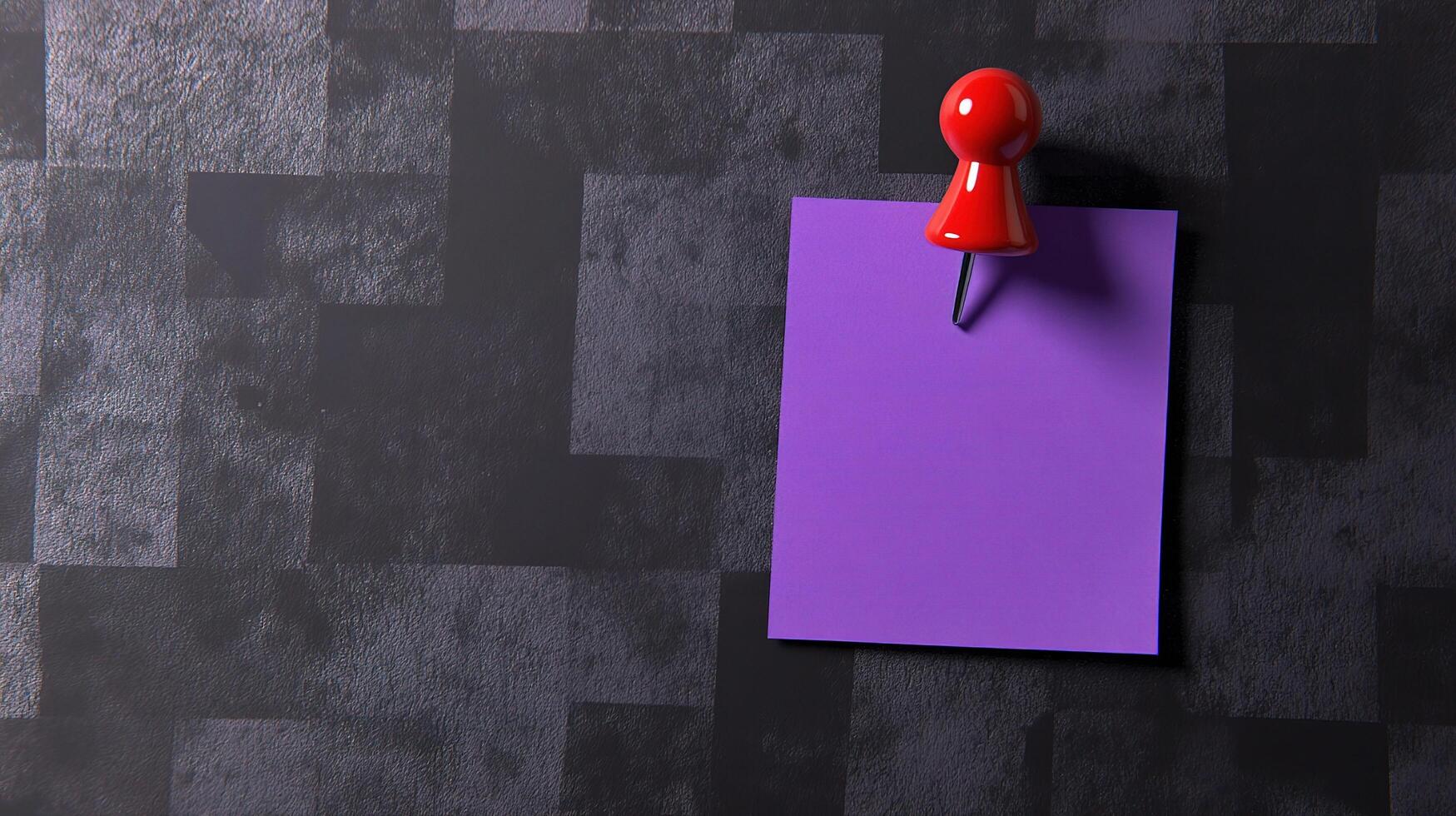 A purple paper with a red push pin on it photo