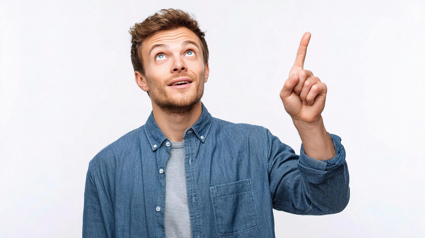 A man pointing up with his finger photo