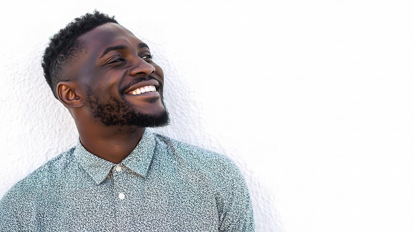 A man is smiling and looking up photo