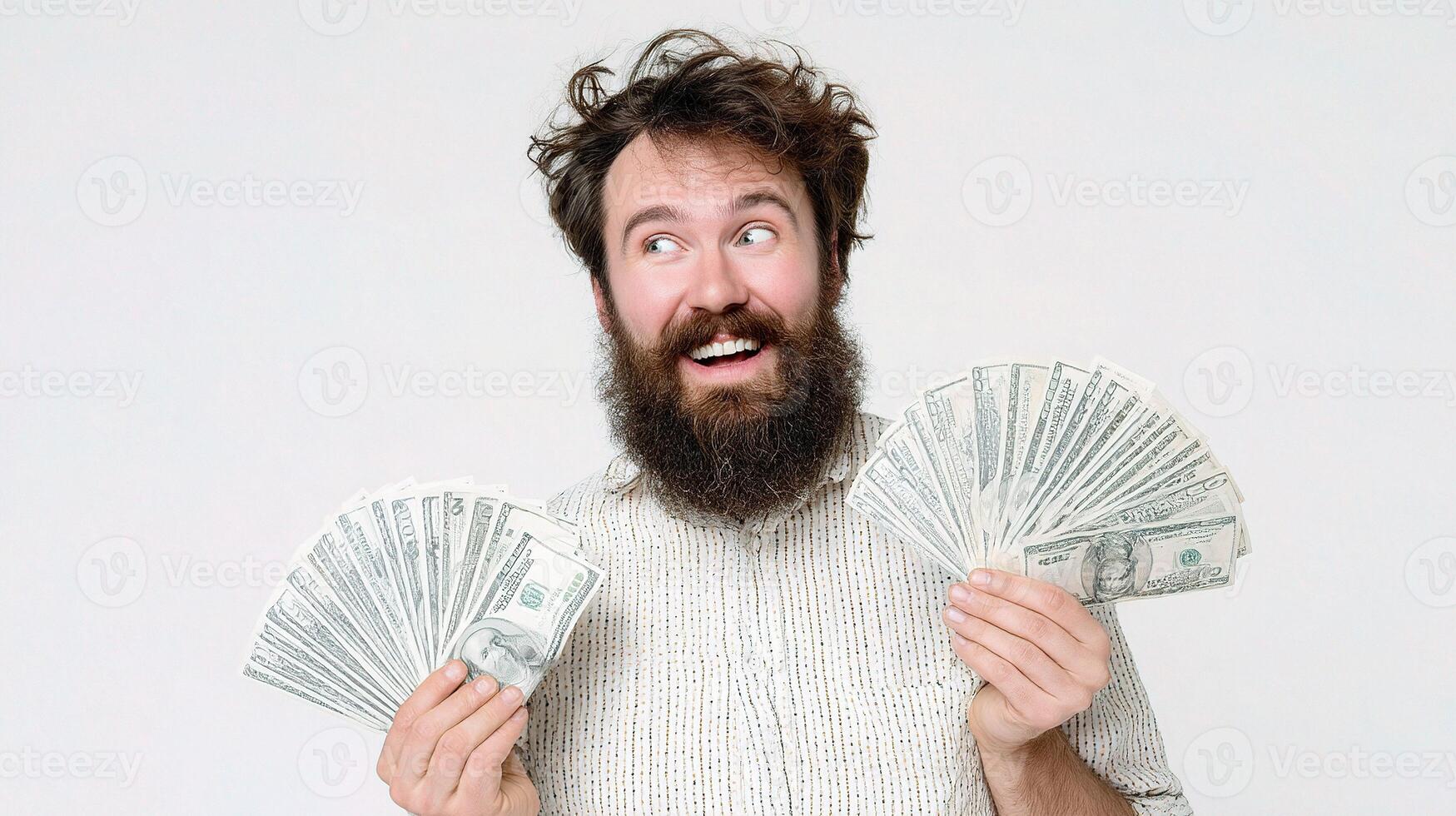 A bearded man holding up two dollars photo