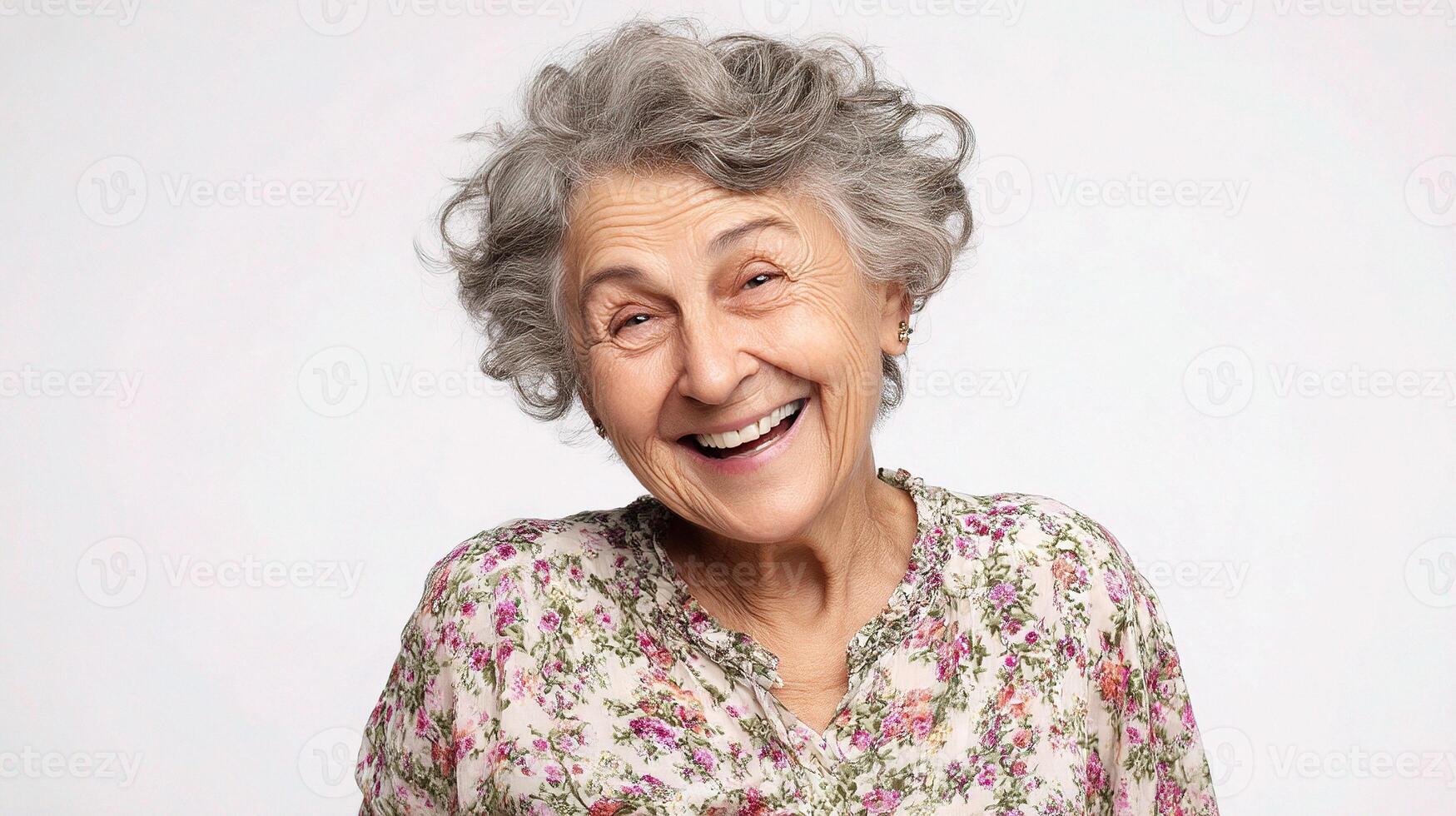 An older woman is smiling and laughing photo