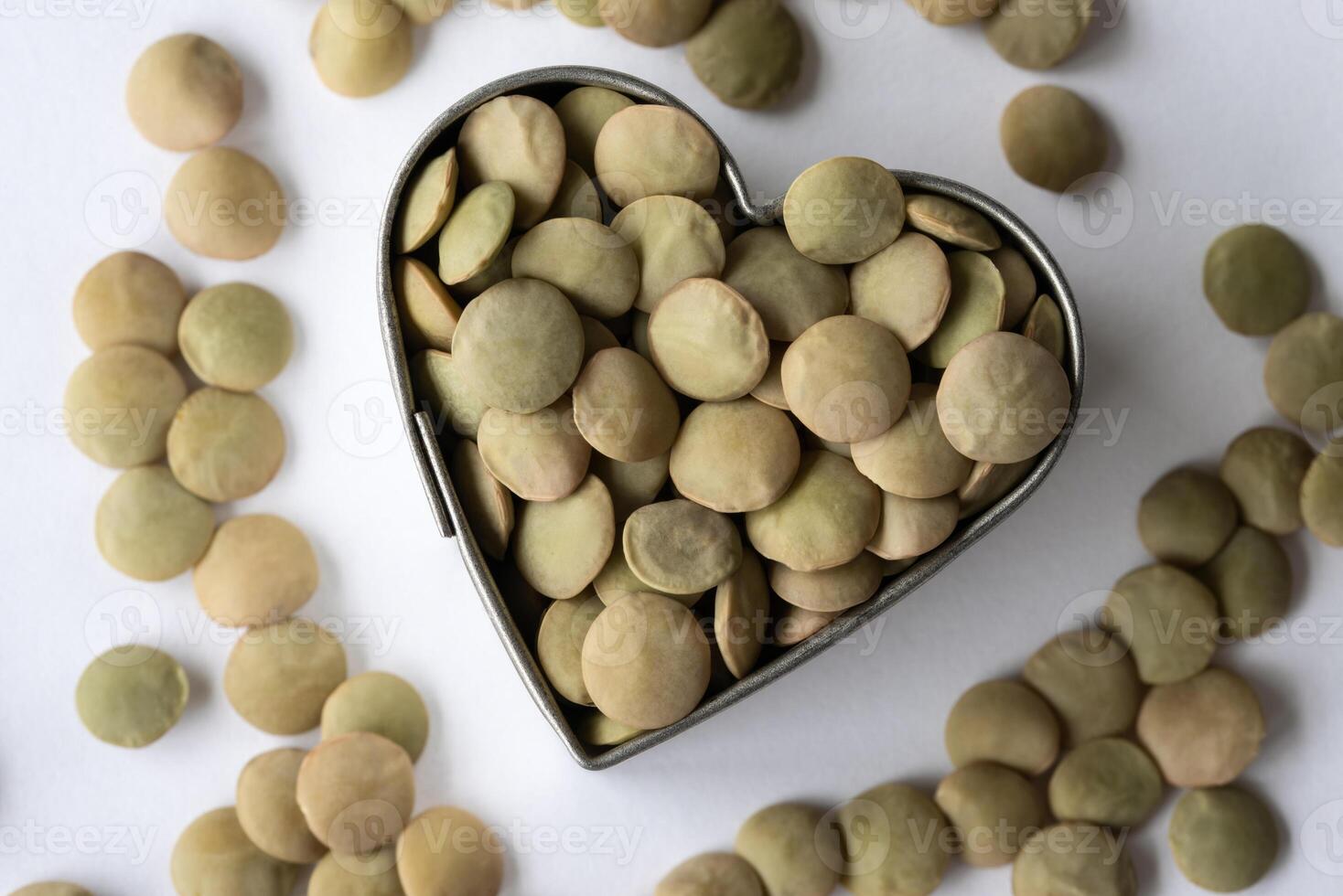 Uncooked Green Lentils in a Heart Shape photo