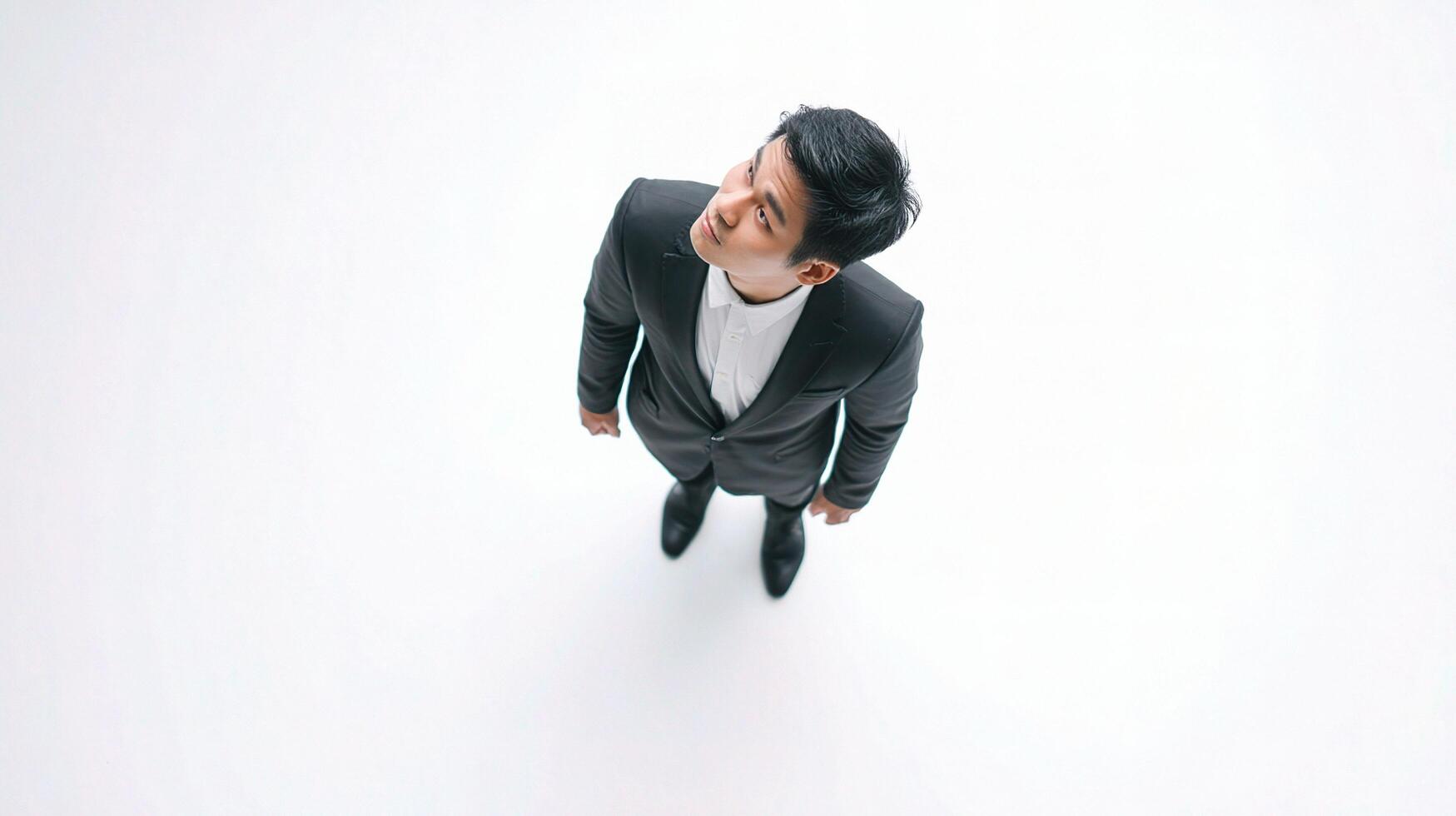An overhead view of a man in a suit photo