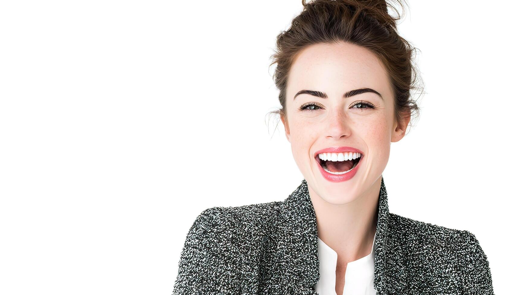 A woman is smiling and holding her hands up photo