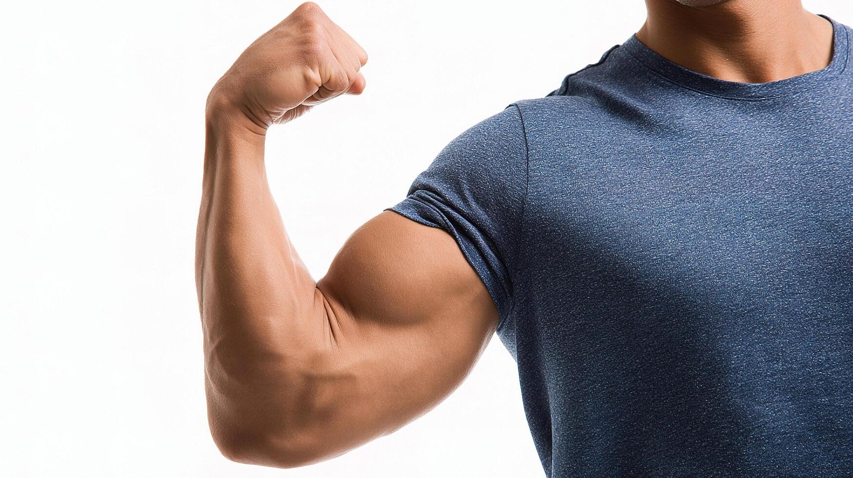 A man flexing his biceps on a white background photo
