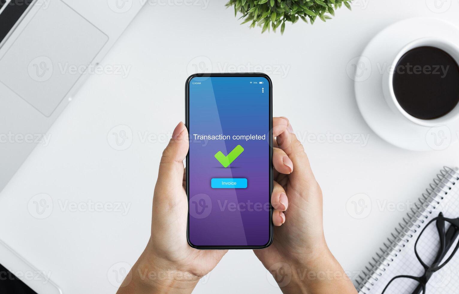 Fast Money Transfers. Woman Holding Smartphone With Transaction Completed Message On Screen, Sitting At Desk In Office, Top View photo