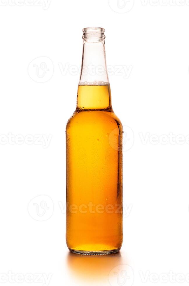 Beer production, brewery and craft drink. Cold full glass bottle of light craft lager with flowing drops, isolated on white background, vertical, cut out, flat lay, close up, copy space, studio shot photo