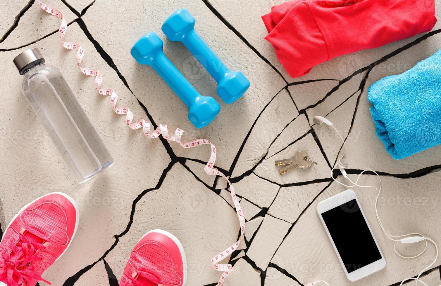 Stylish sport clothing and equipment top view, copy space. Set of new bright fitness outfit, active lifestyle, body care concept photo