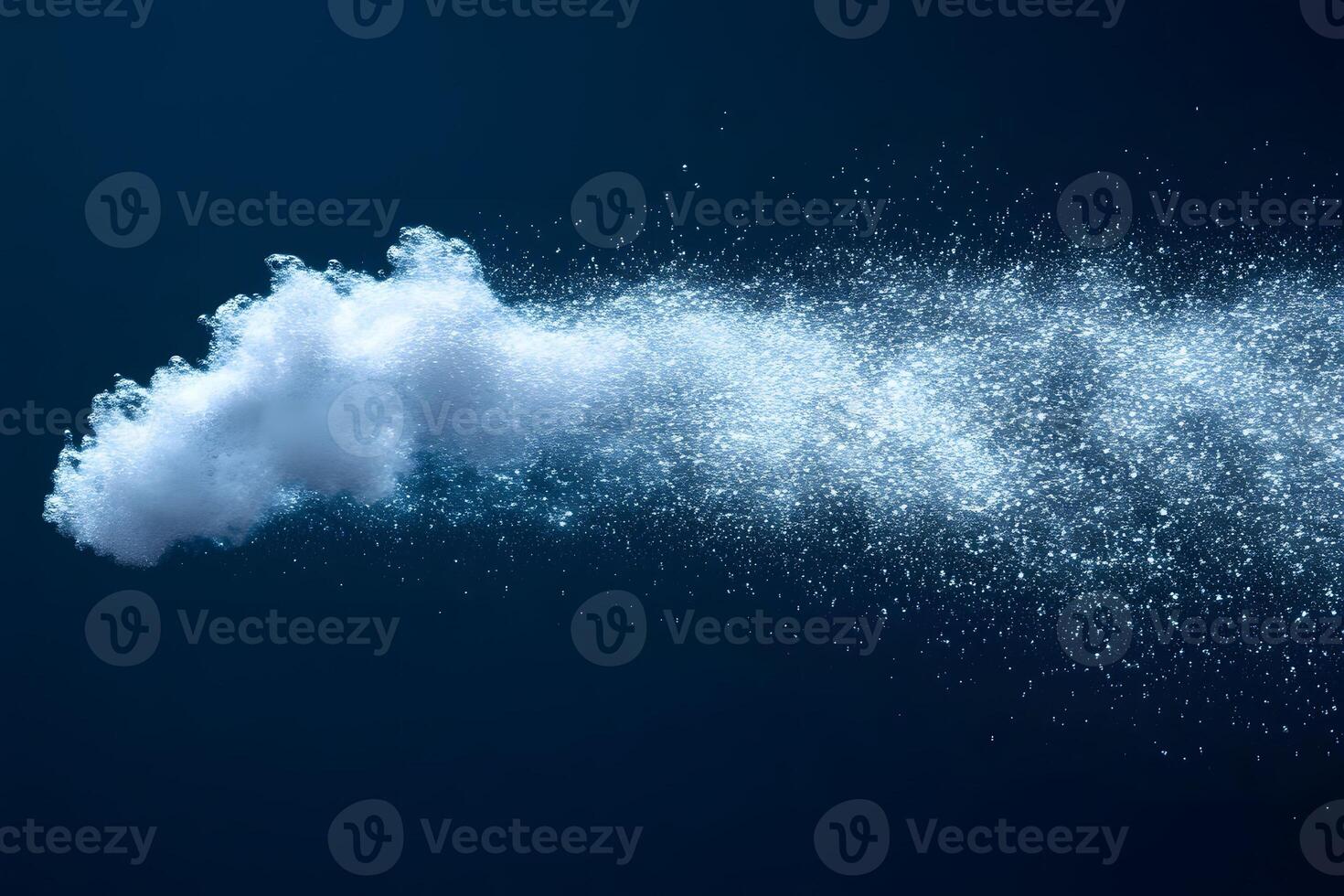 Dynamic Explosion of White Powder on Dark Blue Background for Design and Visual Effects photo