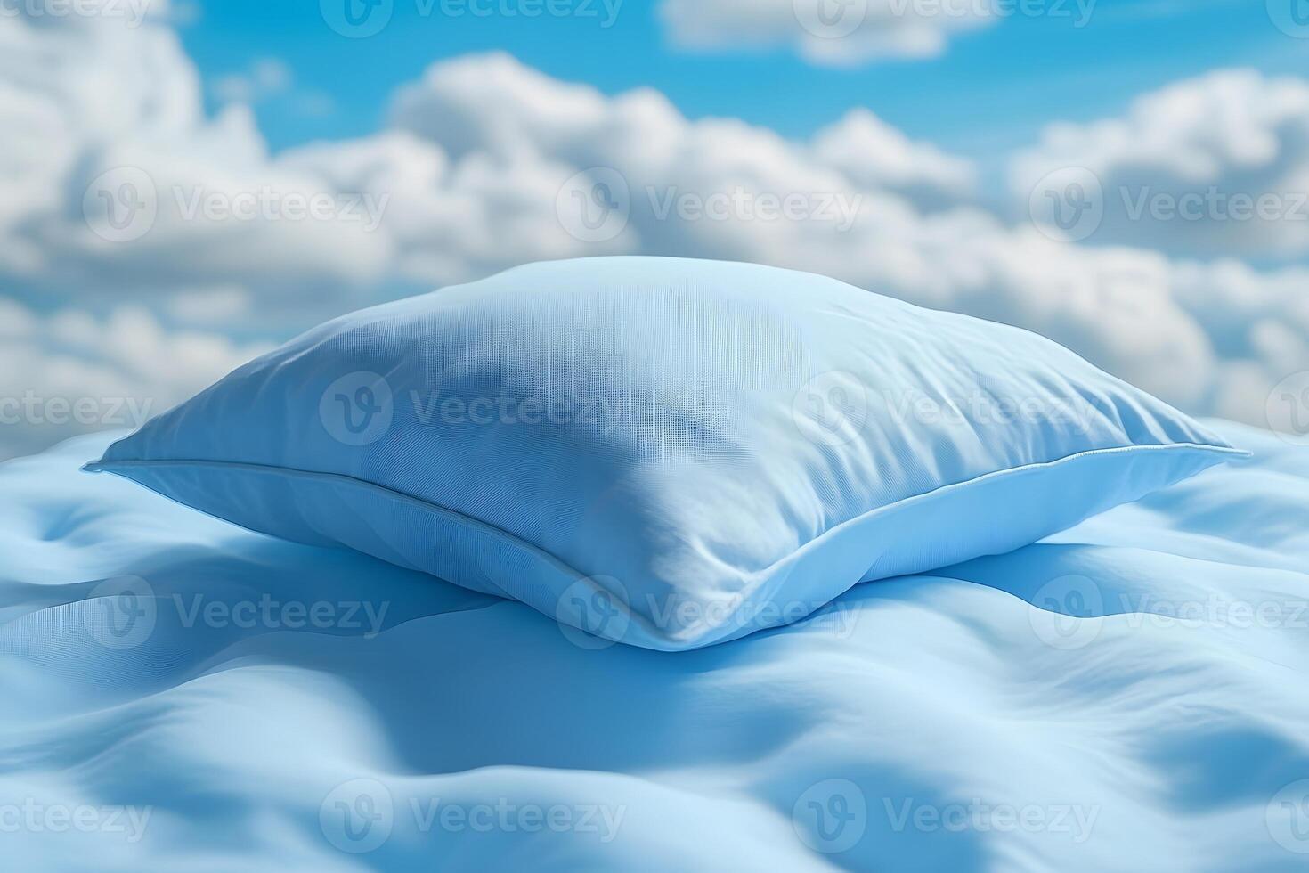 Soft Blue Pillow Floating on Fluffy Clouds Under a Bright Sky - Dreamlike Serenity photo
