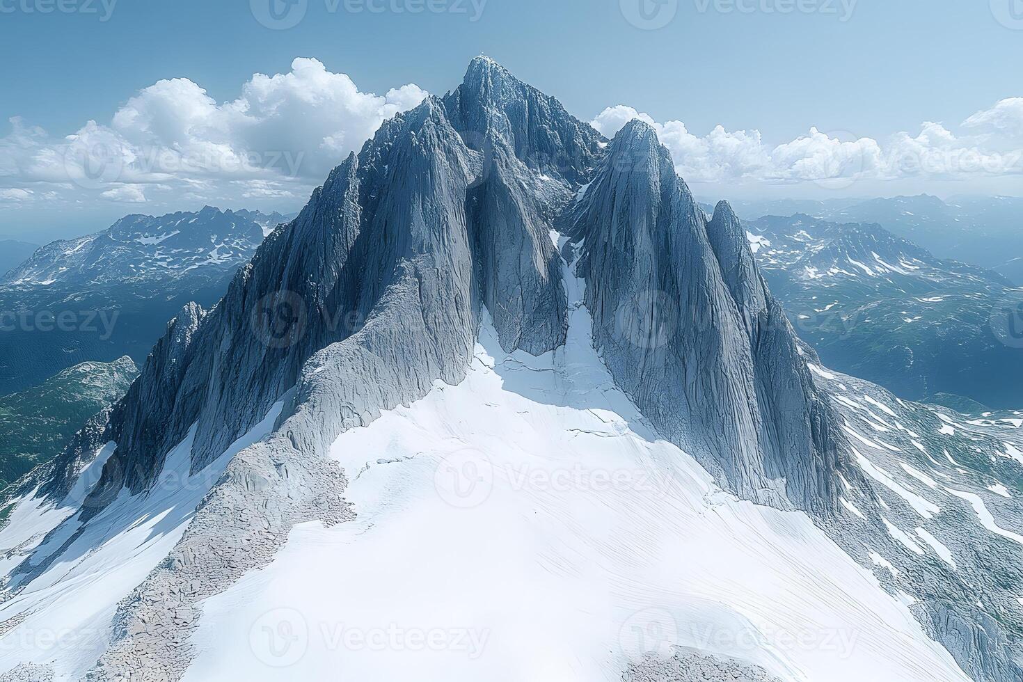 Majestic Snow-Covered Mountain Peaks Under a Clear Blue Sky photo